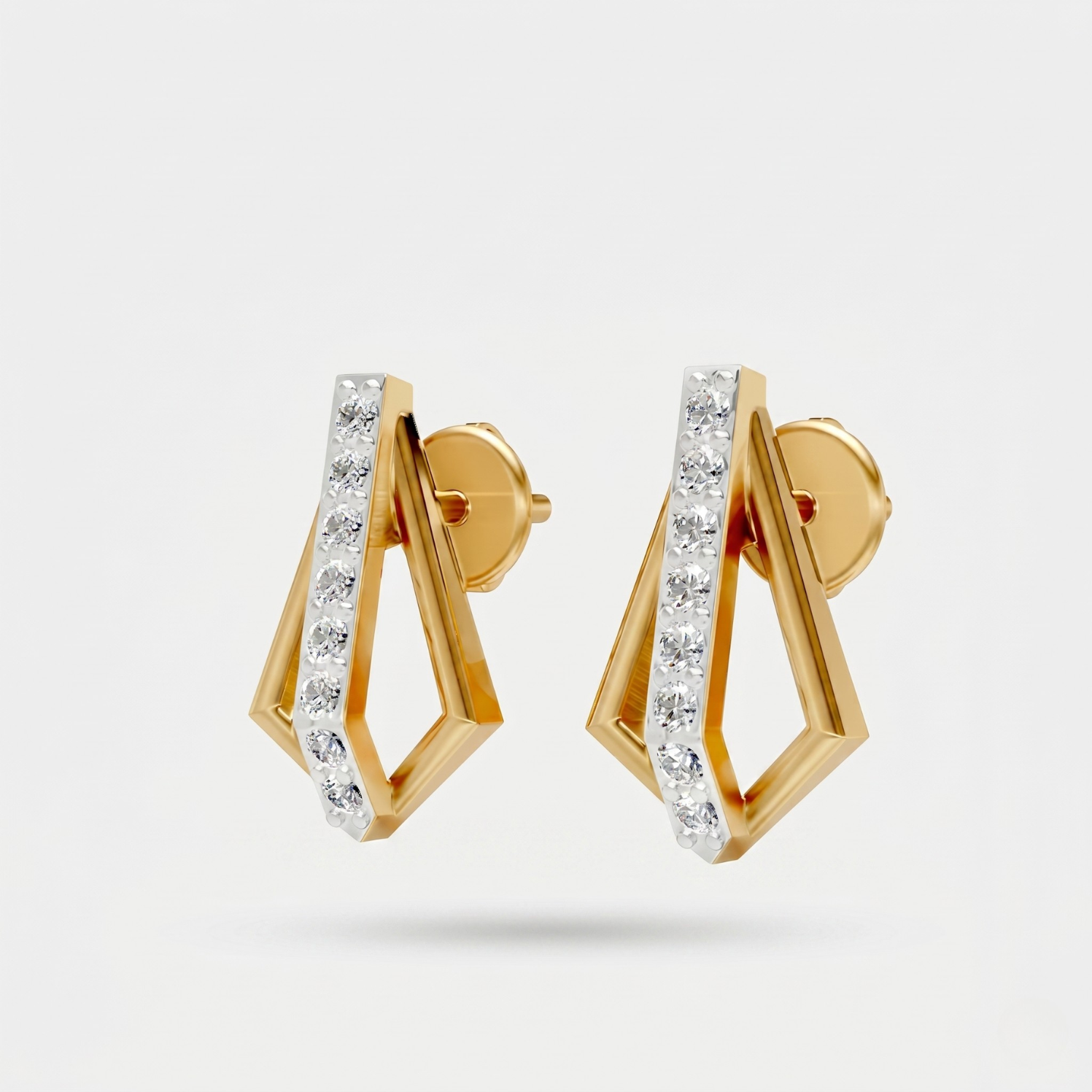 A pair of gold geometric hoop earrings with a row of clear pavé-set stones, shown on a light gray background.