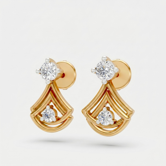 A pair of gold and white gold drop earrings with clear round-cut gemstones, shown on a light gray background.
