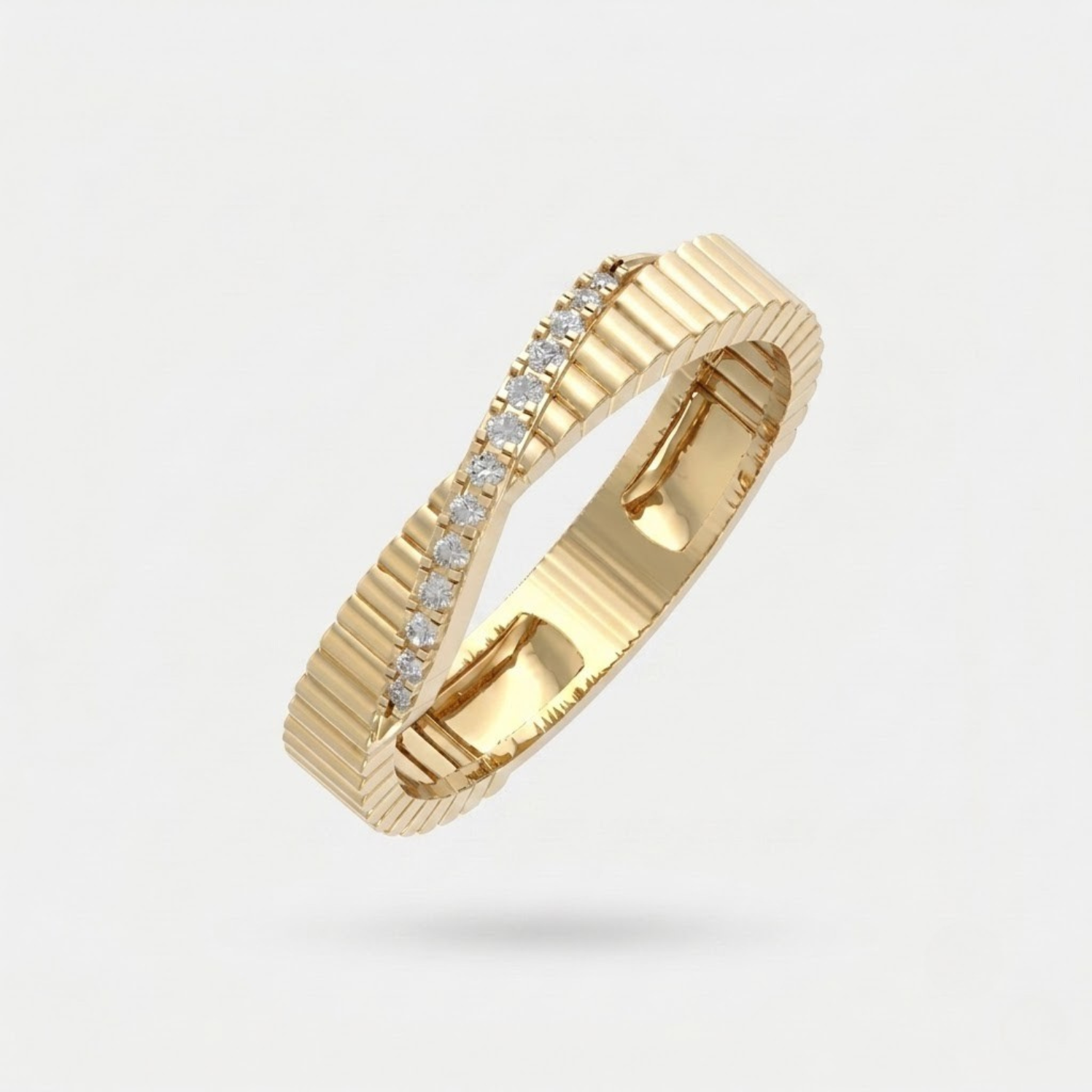 Elegant textured moissanite crossover ring with a ribbed white gold vermeil band featuring a sparkling channel of pavé-set moissanite stones. This modern minimalist statement ring combines geometric texture with refined brilliance, making it perfect for weddings, anniversaries, stacking, everyday wear, or gifting. Crafted with premium moissanite for exceptional fire and lasting elegance.
