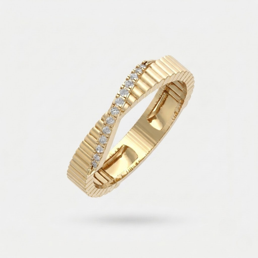 Elegant textured moissanite crossover ring with a ribbed white gold vermeil band featuring a sparkling channel of pavé-set moissanite stones. This modern minimalist statement ring combines geometric texture with refined brilliance, making it perfect for weddings, anniversaries, stacking, everyday wear, or gifting. Crafted with premium moissanite for exceptional fire and lasting elegance.