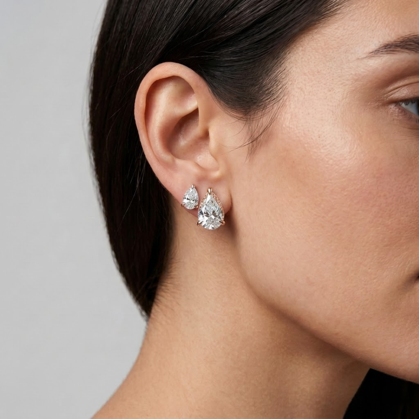 Dual Pear-Cut Diamond Stud Earrings