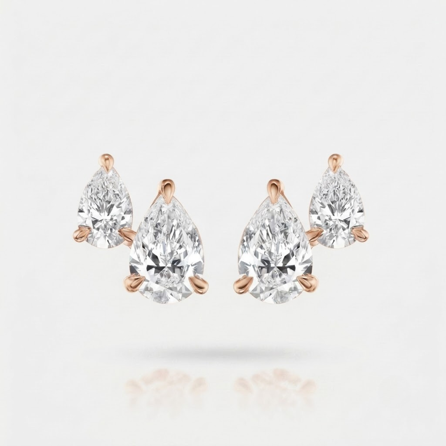 Dual Pear-Cut Diamond Stud Earrings