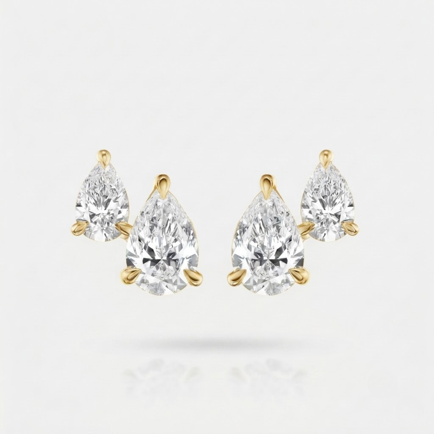 Dual Pear-Cut Diamond Stud Earrings