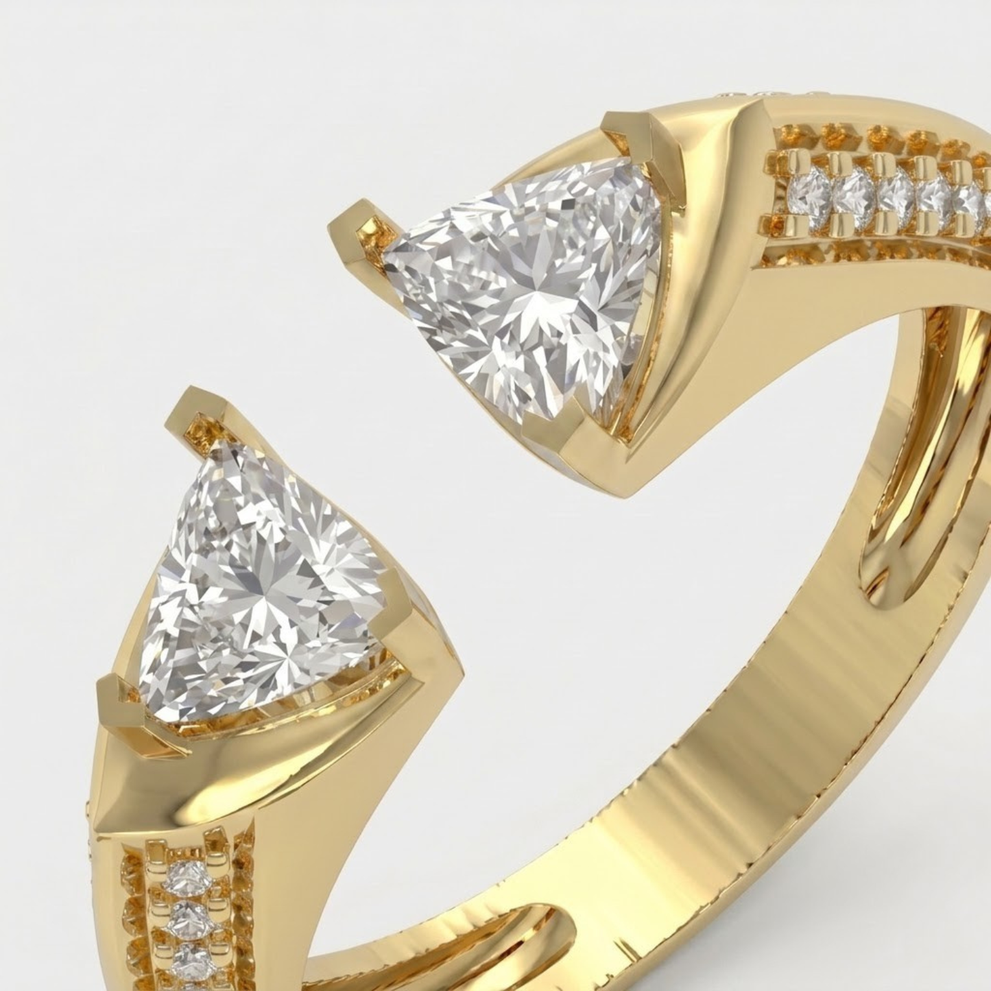 Elegant open triangle moissanite ring featuring two brilliant trillion-cut moissanite stones in a modern bypass open-band design with pavé-set accents on a polished white gold vermeil band, perfect for engagement, promise, stacking, or everyday luxury wear.
